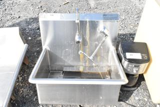 Eagle Stainless Steel Single Bay Sink, no legs, features visible faucet, some wear, label indicating brand and specifications.