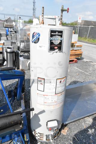 Bradford White MI40T6FBN natural gas storage water heater with Defender Safety System, visible labels, good condition.