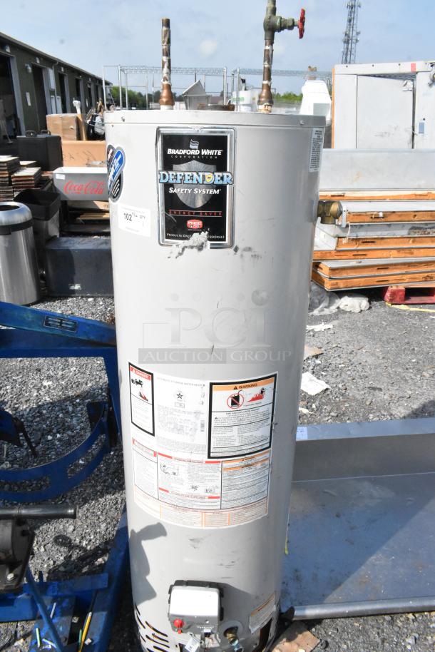 Bradford White MI40T6FBN metal commercial natural gas storage water heater. Tags show model and safety info.