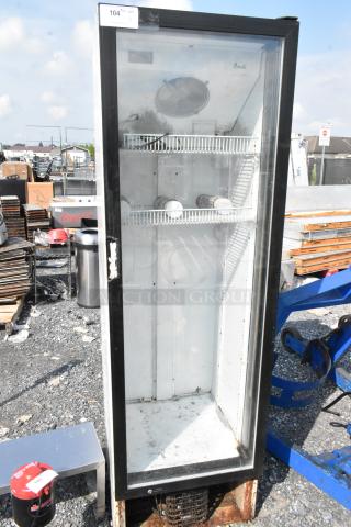 Avanti BCAD353 single door reach-in cooler merchandiser, metal, 115V, showing interior shelves and some exterior wear.
