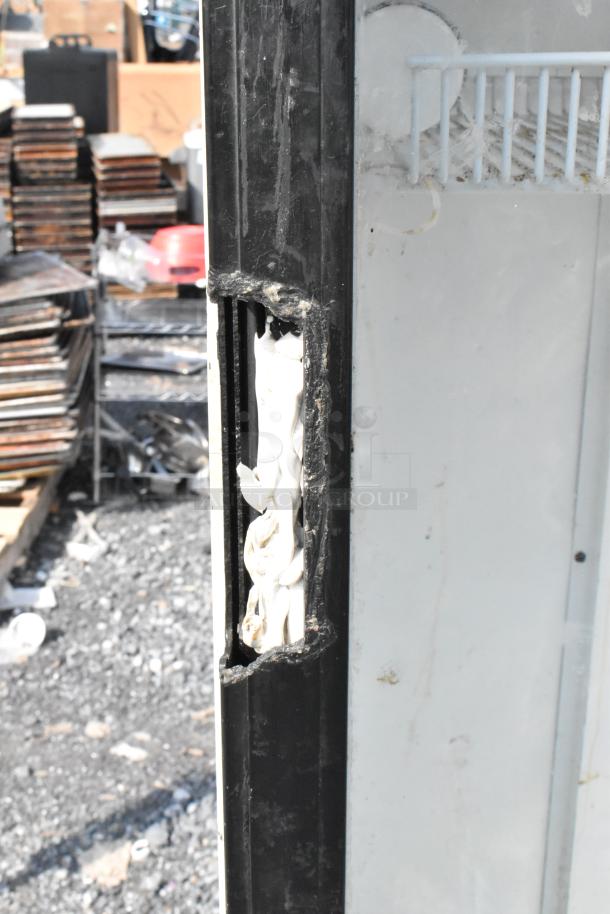 Avanti BCAD353 metal commercial cooler, single door, 115 volts, 1 phase. Visible wear around the door seal.