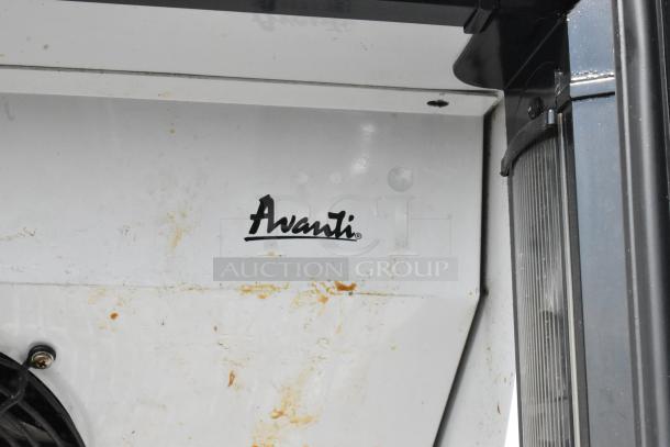 Avanti BCAD353 metal commercial cooler with single door, 115V, showing branding. Signs of wear visible on surface.