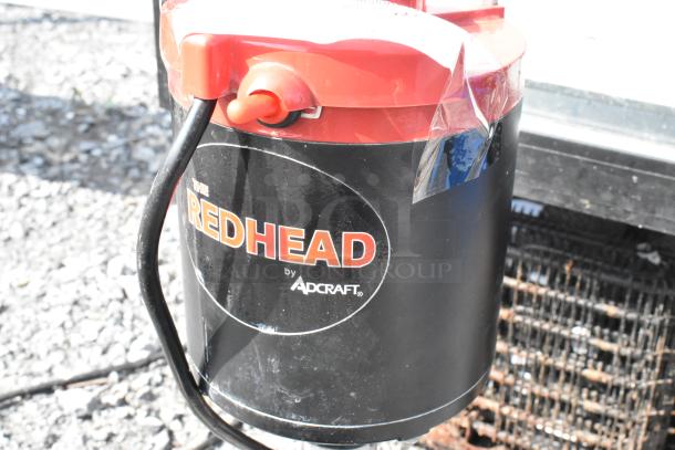 Adcraft GW-120 Redhead Glass Washer, 120 Volts, 1 Phase. Black with red accents, visible label. Good condition.