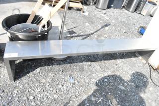 Metal over shelf, rectangular, sturdy design, slight wear, industrial grade, labeled "106" for auction identification.
