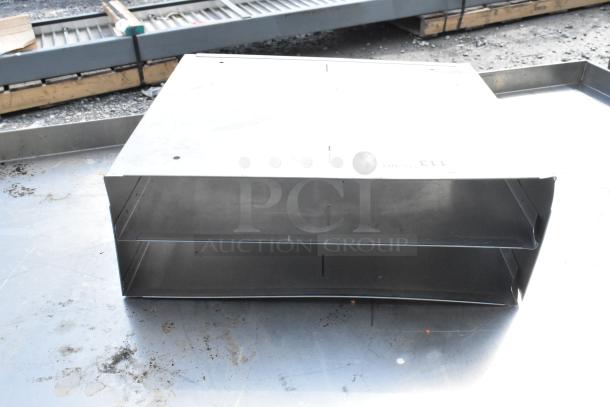 Steel metal bin, rectangular, open on one side. New condition with clean finish. Suitable for storage or industrial use.