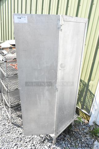 Lockwood metal commercial enclosed pan rack with a faulty door. Visible wear noted. Ideal for commercial kitchen use.