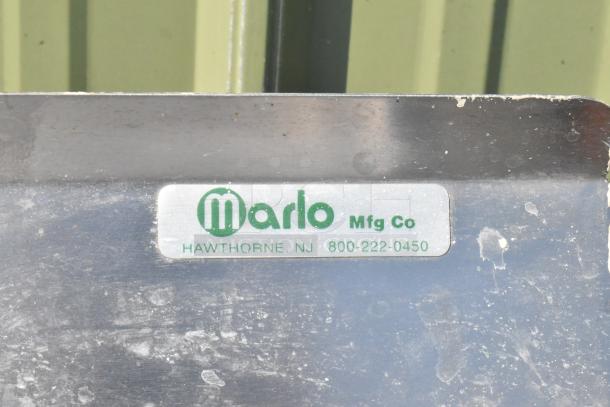 Marlo 3 bay stainless steel sink with dual drain boards, label shows Marlo Mfg Co, Hawthorne, NJ, phone 800-222-0450.