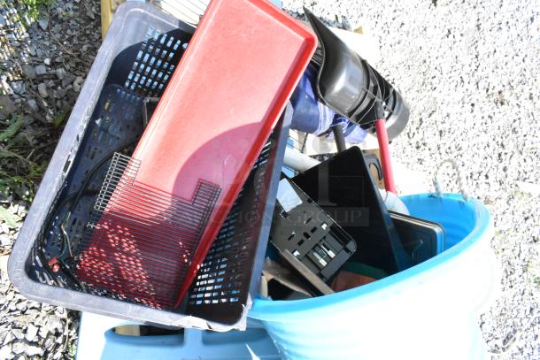 Pallet lot with snow shovels, red poly bucket, and a metal shelf, showing various items in used condition.