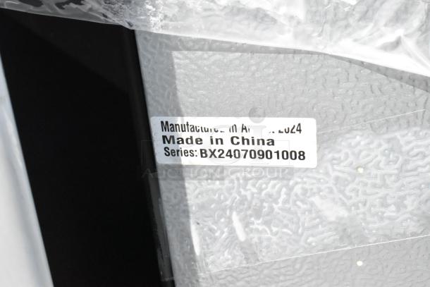 Label on mini cooler indicating manufacture in April 2024, made in China, series BX24070901008.