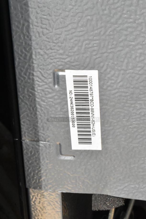 Label on mini cooler, showing barcode and model number. Features Galanz and GE brands, 115V, 1 phase.