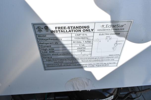Label on EdgeStar CMF151L mini cooler; details voltage, refrigerant, current, PSI, and service info. 115V, single-phase.