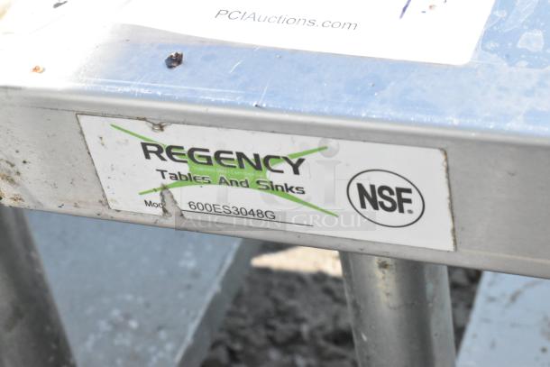 Regency 600ES3048G stainless steel equipment stand, NSF certified label visible, with metal under shelf.