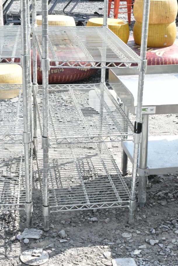 Chrome finish 6-tier wire shelving unit, sturdy metal with adjustable shelves. Buyer dismantle required, consider freight charges.