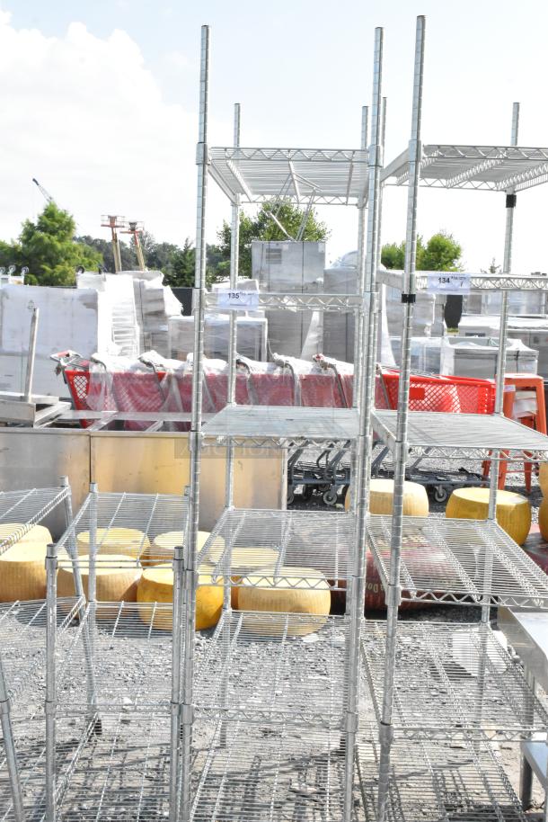 Chrome finish 6-tier wire shelving unit outdoors, dismantling required, freight charges apply, PCI cannot dismantle.