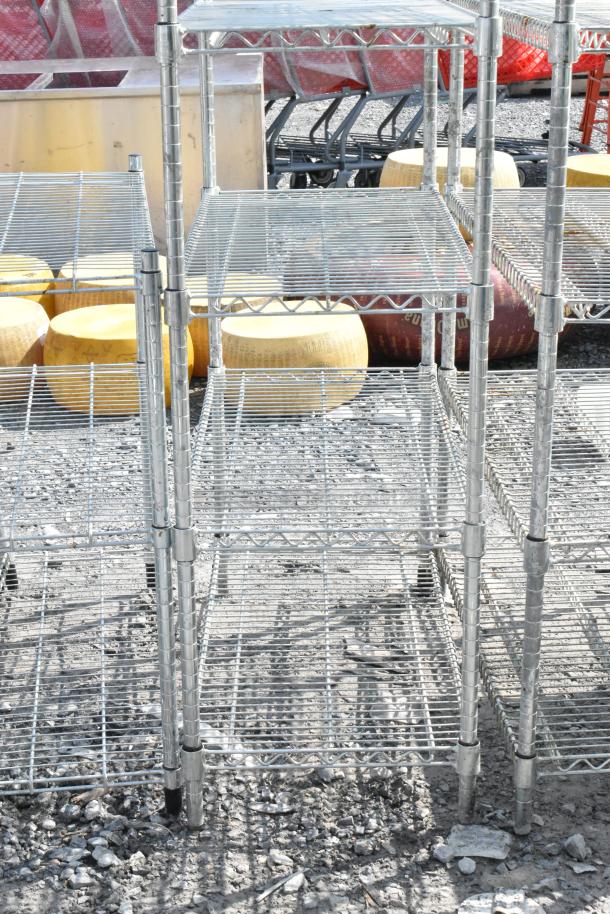 Chrome finish 6 tier wire shelving unit, in good condition. Dimensions unlisted. Buyer must dismantle for shipping.