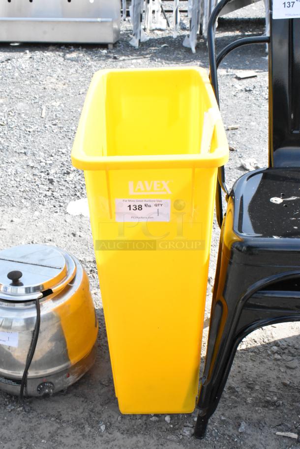 Lavex Yellow Poly Slim Jim trash can, rectangular design, marked with label "138," ideal for space-saving waste management.