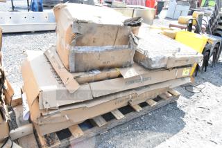 Damaged boxes on pallet labeled with item numbers, including 522SG2472. May contain new scratch and dent stainless steel equipment stands and work tables.