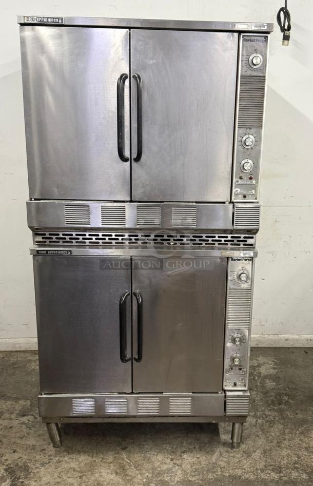 Market Forge M2700HEC double stacked stainless steel convection oven, good condition, with control knobs and sturdy handles.