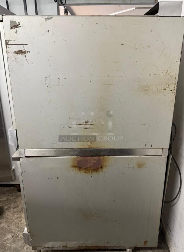 Market Forge M2700HEC double stacked convection oven, visible wear and rust, metal exterior, auction label present.