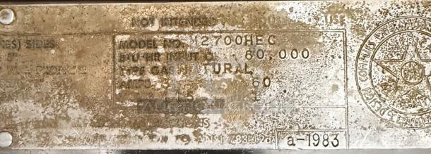Market Forge M2700HEC label, showing model and serial details, 1983, indicating natural gas use and capacity 60,000 BTU.