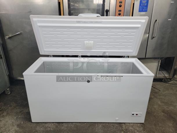 GE 65" 15.7 Cu. Ft. Chest Freezer, Model FCM16SLB, Energy Star Rated, tested and working, open lid view in workshop.