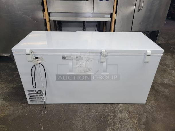 GE 65-inch wide chest freezer, model FCM16SLB, 15.7 cu. ft., Energy Star rated, tested and working condition, white exterior.