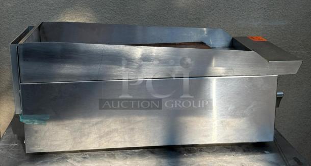 Brand new Dukers DCGM12 gas steel countertop griddle, durable stainless steel, compact design, ideal for commercial kitchens.