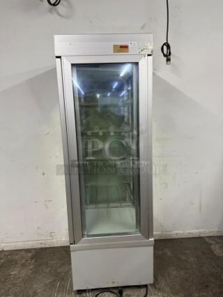 Tekna 4400NFN refrigerated display case, 4-sided glass, tested, working, silver frame, interior shelves, ideal for commercial use.
