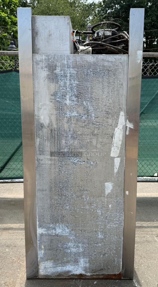 Traulsen ART 1-32 LUT 36" stainless steel roll-in refrigerator. Solid door, used, visible wear and marks.