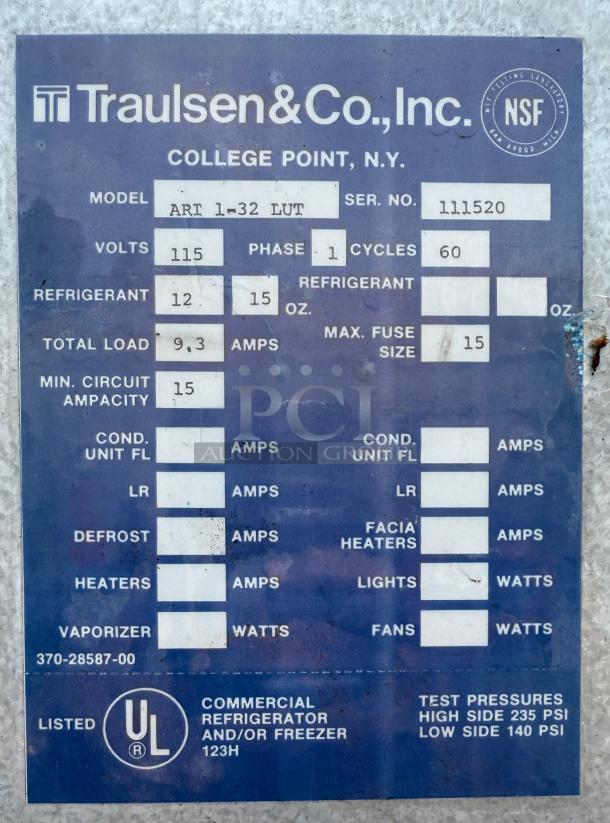 Traulsen ART 1-32 LUT refrigerator label showing model, serial number, and technical specifications.