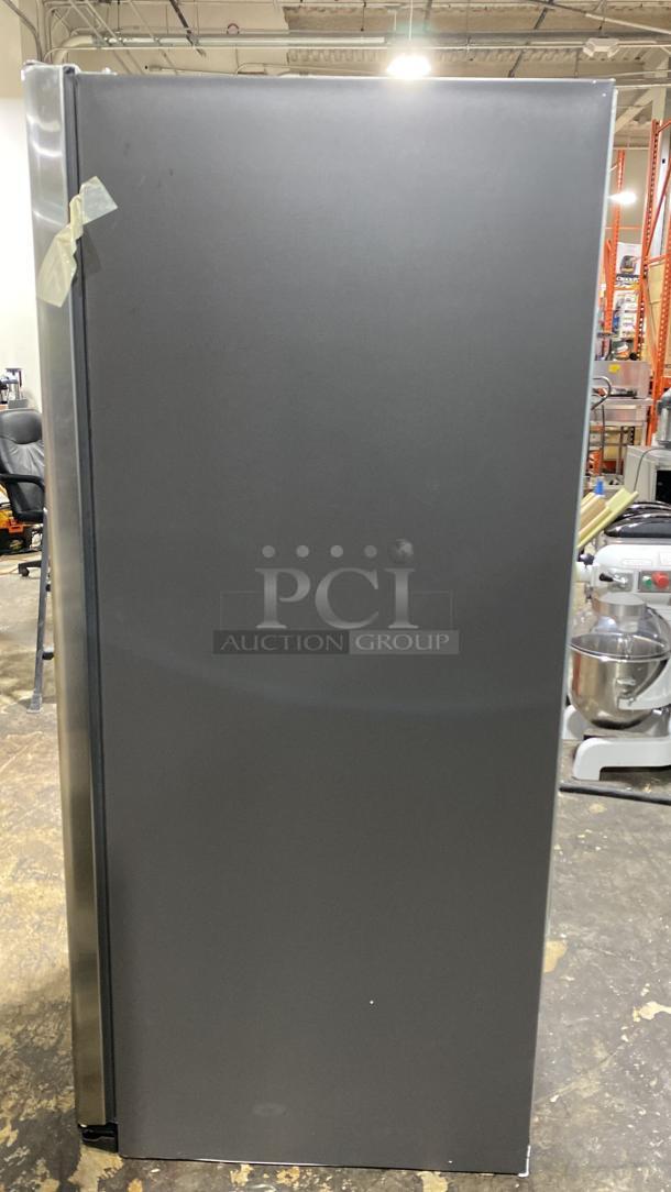 Brand new GE side-by-side refrigerator, model GSE25GYPFS, stainless steel with external ice and water dispenser.