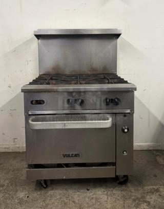Vulcan 36S-6B Endurance Restaurant Range, 36", 6-burner, standard oven, sturdy metal, visible wear, brand logo on front.