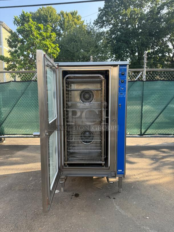 Cleveland Combi Craft Oven, stainless steel, open door view, racks inside, control panel on side, well-maintained condition.