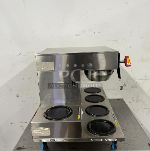 Bunn Axiom 0/6 Twin 12 Cup Automatic Coffee Brewer, six lower warmers, stainless steel, used, model 38700.0015.