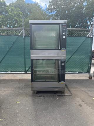 HOBART HRW303 electric rotisserie oven and warmer, stainless steel, dual glass doors, visible controls, caster wheels.