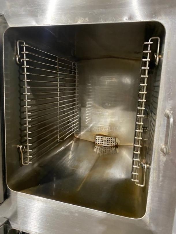 Cleveland Range SteamCraft Power-10 dual compartment convection steamer interior, stainless steel, built-in pan holding racks.