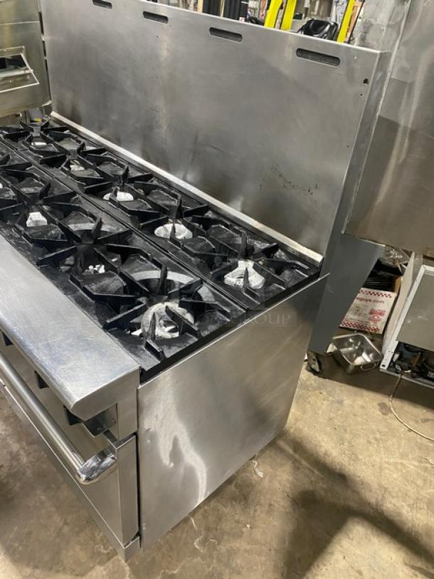 American Range stainless steel 10-burner, natural gas range with double oven, backsplash, wired racks, on casters, commercial.