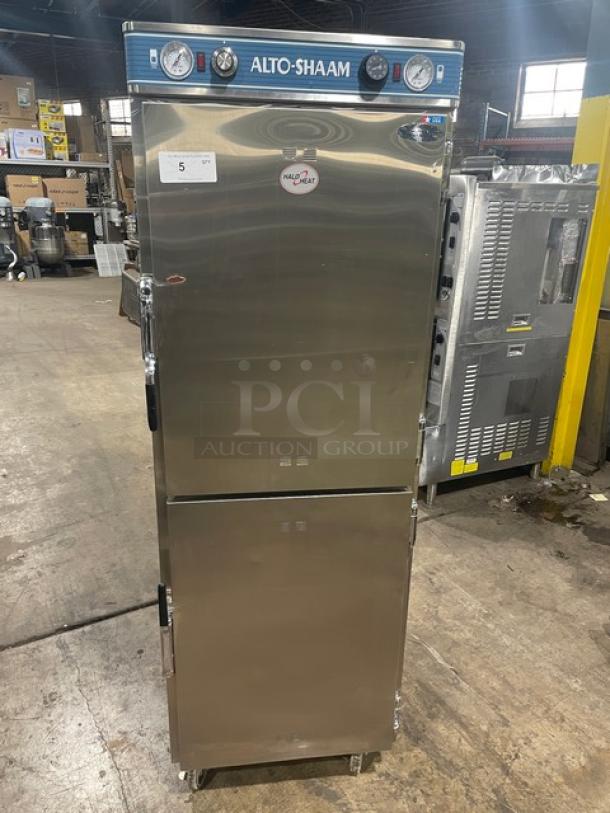 Alto-Shaam 1200-UP/SR stainless steel heated holding cabinet, dual doors, chrome wire racks, upper/lower controls, on casters.