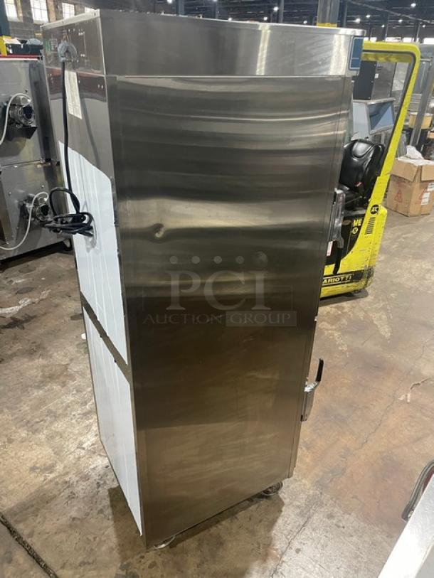 Alto-Shaam 1200-UP/SR stainless steel heated cabinet with dutch doors, chrome racks, upper & lower controls, on casters.