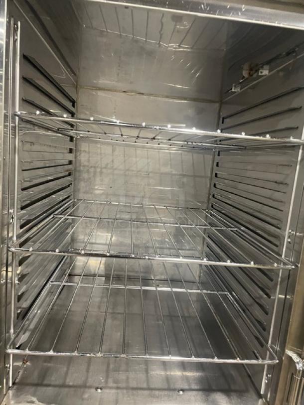 Alto-Shaam 1200-UP/SR heated holding cabinet interior, chrome wire racks, stainless steel, model 1200UPSR, dutch door.