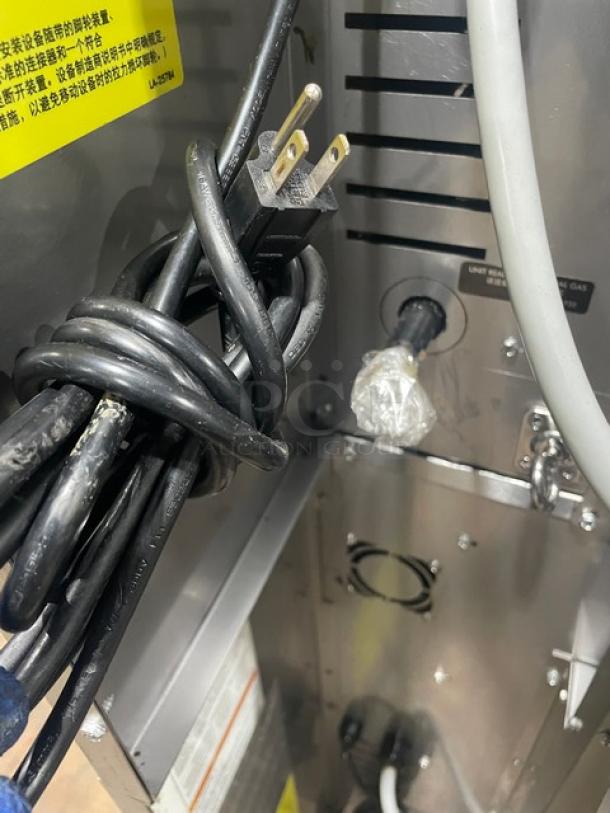Alto-Shaam ASC-4G convection oven rear view showing power cord, wrapped gas connection, and ventilation details.