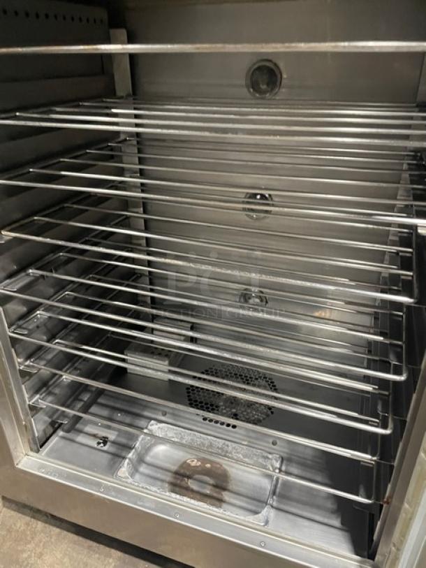 Nu-Vu SUB123 stainless steel double deck oven/proofer with wired racks, electric, model SUB123, on casters, 208V 3+N phase.