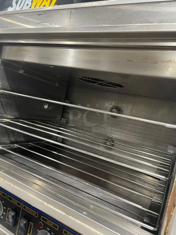 Nu-Vu SUB123 stainless steel double deck oven/proofer combo, wired racks, model shown, 208V 3+N phase, on casters.