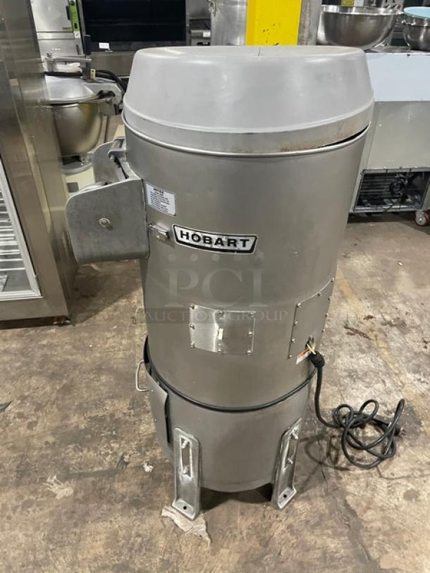 Hobart commercial potato peeler, model 6460C, 60 lb capacity, electric, 115V, on legs, includes stand, used condition.