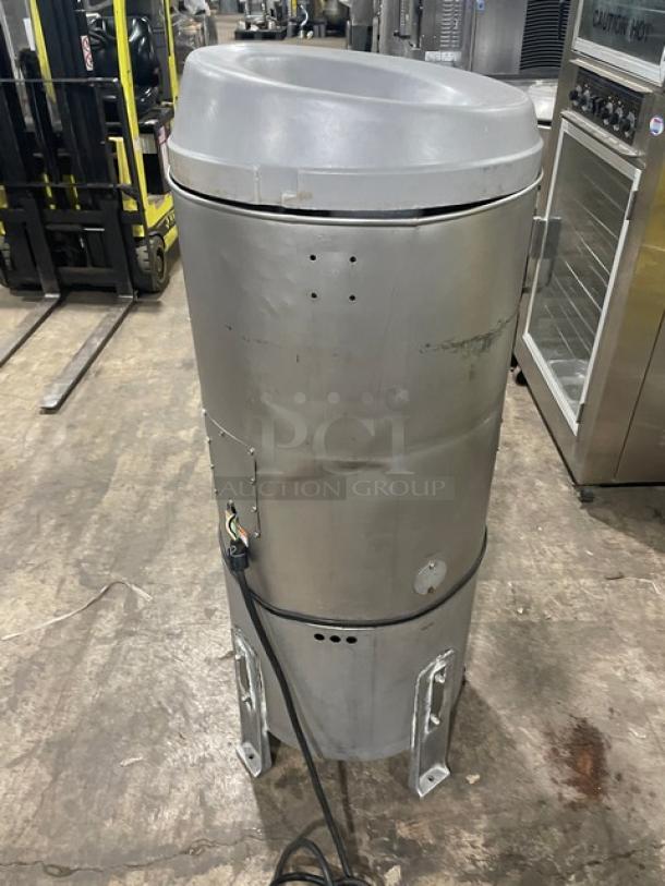 Hobart 6460C commercial electric potato peeler, 60 lb capacity, stainless steel, on legs, includes stand. Working condition.