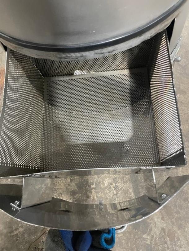 Hobart Model 6460C commercial 60 lb. electric potato peeler with stand, 115V, in working condition, shown on legs.
