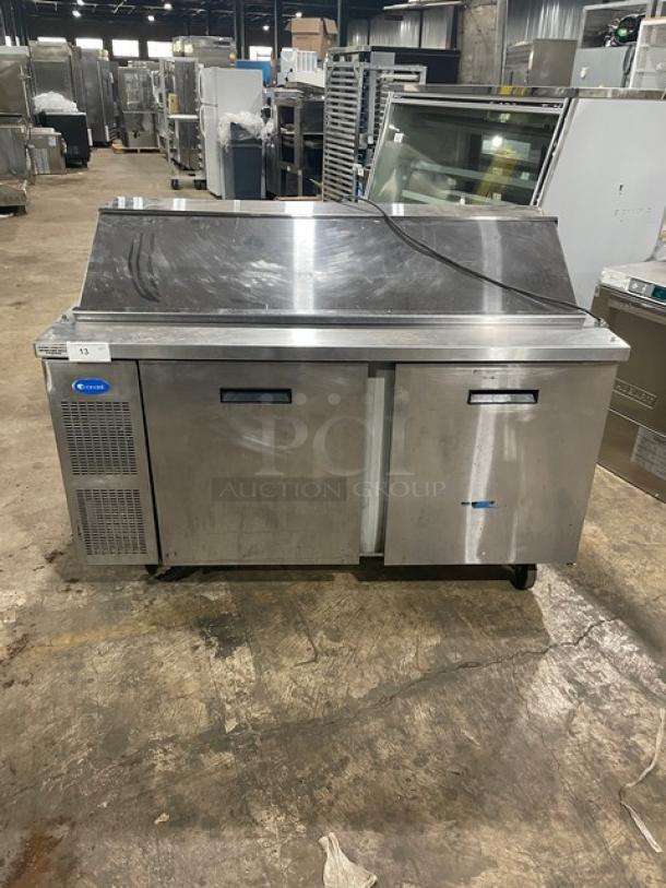 Randell stainless steel 2-door refrigerated prep table, model 9040K7, with poly-coated wire rack, on casters, 115V.