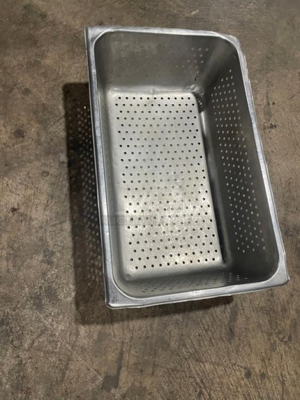 Commercial full-size stainless steel perforated hotel pan, excellent condition, durable, ideal for steam tables.