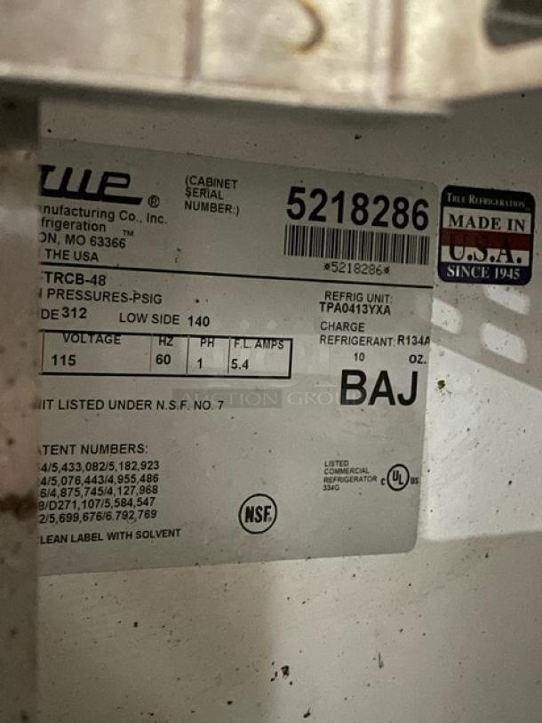 True TRCB-48 refrigerated low boy label, SN: 5218286, 115V 1 phase, NSF certified, made in USA, refrigerant R134A.