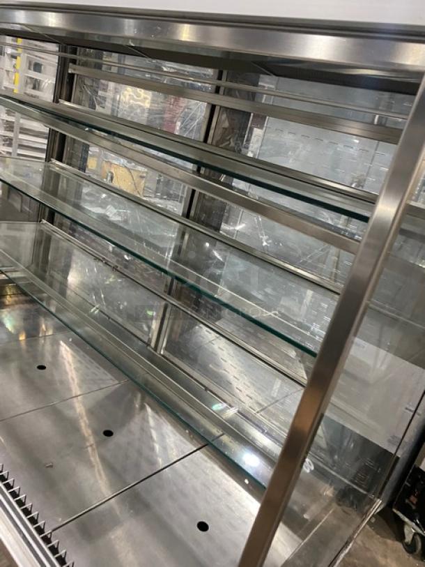 RPI Industries Vienna Series stainless steel refrigerated display case, model VIAS434RSQSC, with glass shelves, rear access doors.
